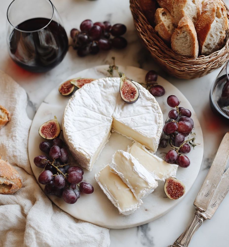 Famous French Foods Brie cheese with grapes and figs